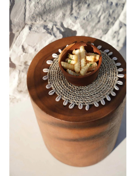 Le dessous de plat en coquille de raphia