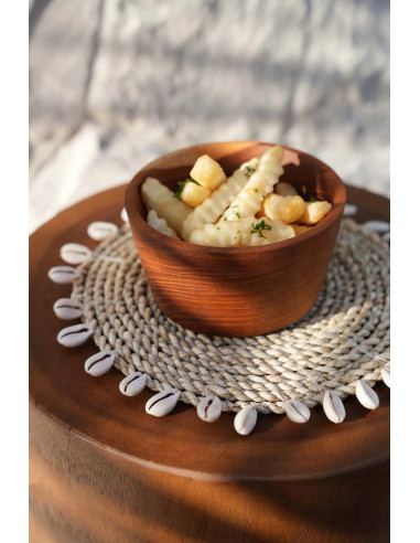 Le dessous de plat en coquille de raphia